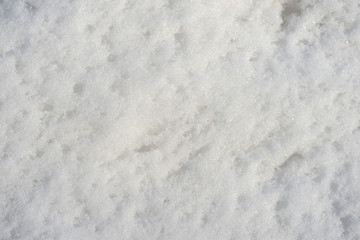 Obraz premium White snow texture on a sunny day. Winter background