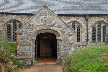 Fototapeta na wymiar Entrance to the Parish Church of St Winwaloe in Gunwalloe, Cornwall