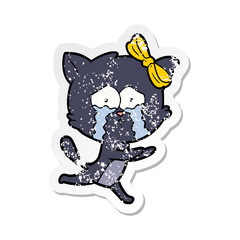 distressed sticker of a cartoon cat