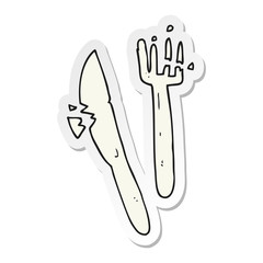 sticker of a cartoon cracked plastic cutlery
