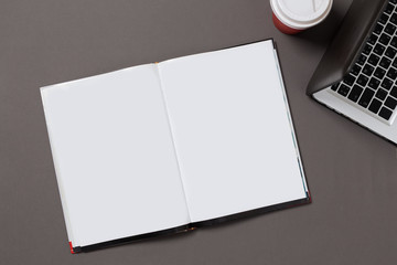 office desk top view with blank notebook  isolated on gray, with clipping path, changeable...
