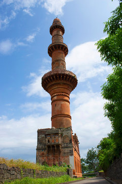 Chand Minar minaret facade at Daulatabad, Maharashtra, India.