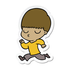 sticker of a cartoon calm boy
