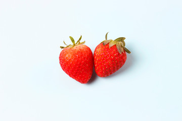 Strawberry isolated on blue background, close up, healthy eating concept, natural products.