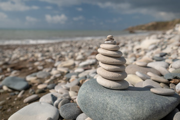Pyramid of pebbles on the beach