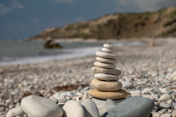 Pyramid of pebbles on the beach