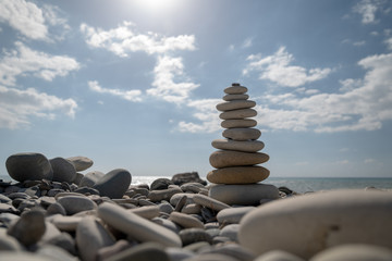 Pyramid of pebbles on the beach