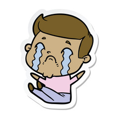 sticker of a cartoon man crying