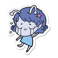 sticker of a cartoon crying alien girl