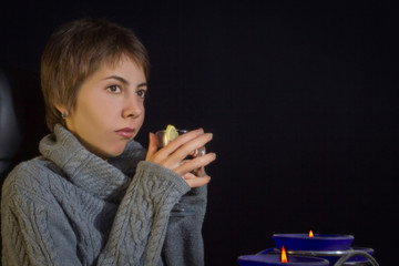 Young woman with hot drink