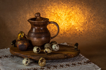 Festive Easter still life with eggs and earthenware jug. Blank for cards.