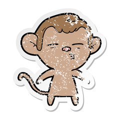 Obraz premium distressed sticker of a cartoon suspicious monkey