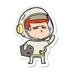 sticker of a cartoon stressed astronaut