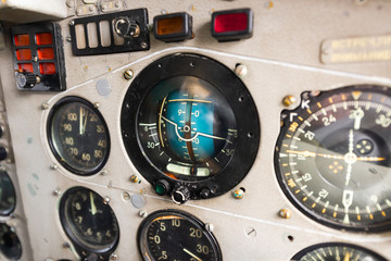 Dashboard of an old airplane. The main aircraft gauge, artificial horizon.