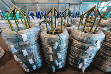Industrial warehouse of cold rolled wire. The wire coils are stacked off the stack