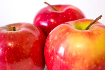  Ripe red apples close up on white background 