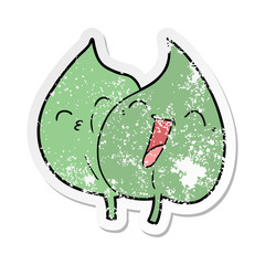 distressed sticker of a funny cartoon leaves