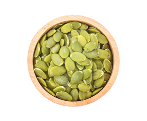 Pumpkin seeds on white background.