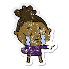 distressed sticker of a cartoon crying woman