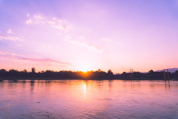 Beach with island sun light and blue sky background.