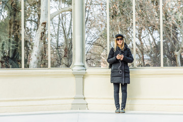 Girl listening to music on her mobile