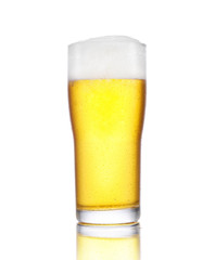 Cold Craft light Beer in a glass with water drops. Craft Beer close up isolated on white background.