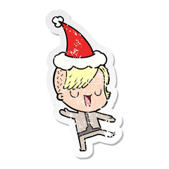 cute distressed sticker cartoon of a girl with hipster haircut wearing santa hat
