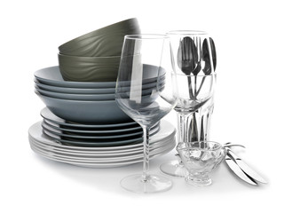 Set of clean tableware on white background