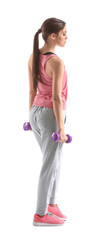 Fototapeta premium Sporty young woman with dumbbells on white background