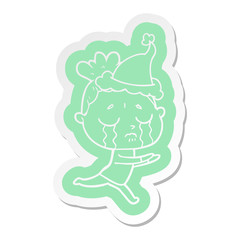 cartoon  sticker of a crying woman wearing santa hat