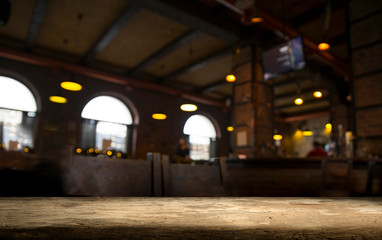 Beer barrel with beer glasses on a wooden table. The dark brown background.