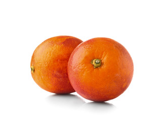 Tasty blood orange fruit on white background