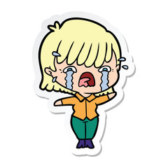 sticker of a cartoon girl crying
