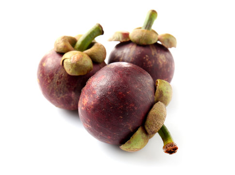 Tasty mangosteen fruit on white background