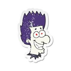retro distressed sticker of a cartoon grinning vampire