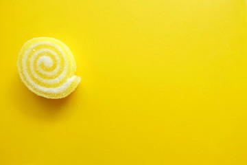 yellow candy on yellow background