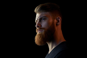 Young bearded man in a black shirt