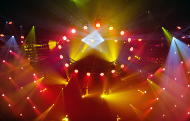 concert light red spotlight rays