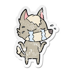distressed sticker of a cartoon crying wolf