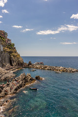 Fototapeta na wymiar Italy, Cinque Terre, Manarola, a large body of water