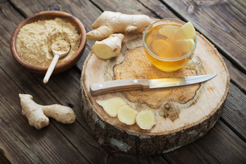 ginger tea on old wooden background