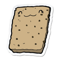 sticker of a cartoon biscuit