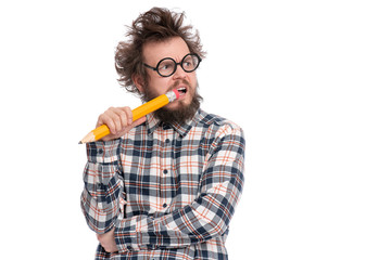 Crazy thoughtful bearded Man in plaid shirt with funny Haircut in eye Glasses holding Big Pencil -...