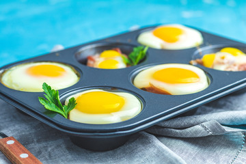 Portioned casserole from bacon sowbelly and eggs in Italian style