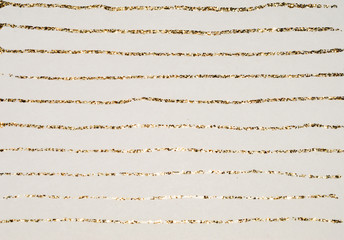 Background with glittering stripes on paper in nostalgic colors, made with golden glitter