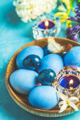 Fototapeta na wymiar Happy Easter festive greeting card in blue style.