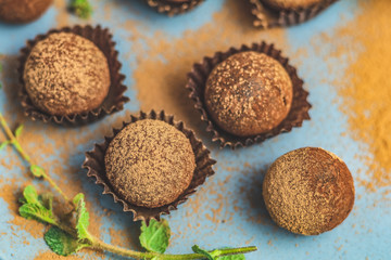 Cocoa balls, handmade chocolate balls cakes in a blue tray