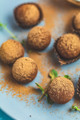 Cocoa balls, handmade chocolate balls cakes in a blue tray