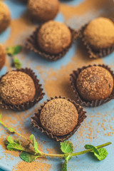 Cocoa balls, handmade chocolate balls cakes in a blue tray