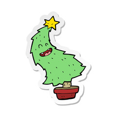 sticker of a cartoon dancing christmas tree